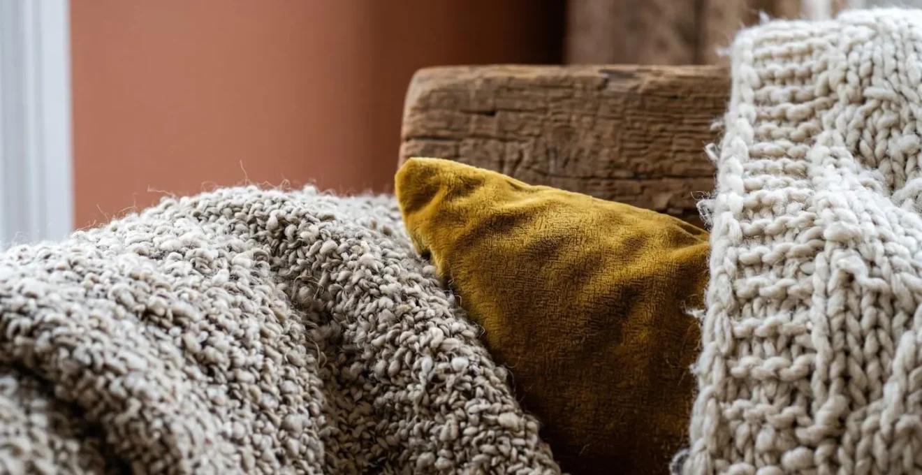 Cozy north-facing room with warm textiles and strategic lighting